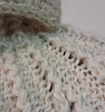 Dettaglio della cappa a maglia di Giuliano e Giusy Marelli